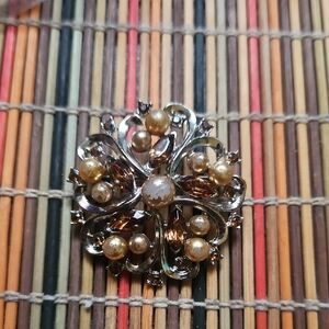 Elegant Gold and Silver Floral Brooch